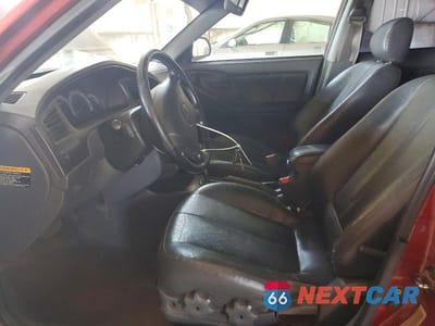 Zdjęcie 7 z 12 samochodu: 2003 HYUNDAI ELANTRA GT VIN:KMHDN55D63U089710 - miniatura