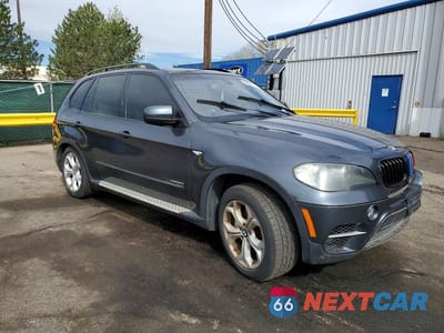 Czwarte zdjęcie samochodu z boku: 2011 BMW X5 XDRIVE50I VIN:5UXZV8C51BL420056 - miniatura
