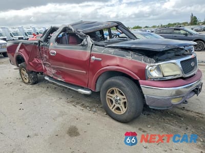 Czwarte zdjęcie samochodu z boku: 2003 FORD F150 VIN:1FTRX18W53NA54564 - miniatura