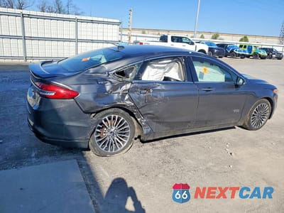 Trzecie zdjęcie samochodu z tyłu: 2017 FORD FUSION TITANIUM PHEV VIN:3FA6P0SU1HR272239 - miniatura