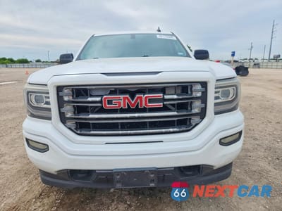 Piąte zdjęcie samochodu w środku: 2016 GMC SIERRA K1500 SLT VIN:3GTU2NEC6GG348516 - miniatura