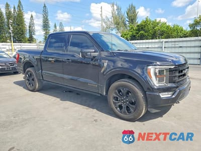 Czwarte zdjęcie samochodu z boku: 2022 FORD F150 SUPERCREW VIN:1FTFW1ED0NFB03448 - miniatura