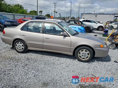 Czwarte zdjęcie samochodu z boku: 2000 TOYOTA COROLLA VE VIN:2T1BR12E2YC302209 - miniatura