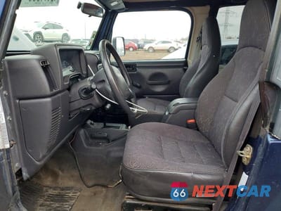 Zdjęcie 7 z 12 samochodu: 2002 JEEP WRANGLER / TJ SPORT VIN:1J4FA49S92P743764 - miniatura