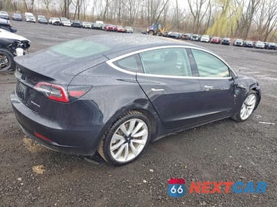 Trzecie zdjęcie samochodu z tyłu: 2018 TESLA MODEL 3 VIN:5YJ3E1EB2JF071816 - miniatura