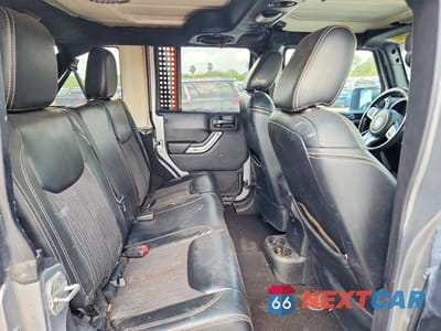 Zdjęcie 10 z 12 samochodu: 2013 JEEP WRANGLER UNLIMITED SPORT VIN:1C4BJWDG4DL628857 - miniatura