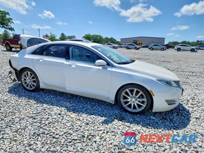 Czwarte zdjęcie samochodu z boku: 2016 LINCOLN MKZ HYBRID VIN:3LN6L2LU3GR612694 - miniatura