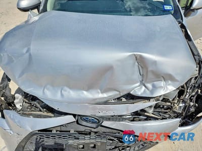 Zdjęcie 11 z 12 samochodu: 2022 TOYOTA COROLLA HYBRID LE VIN:JTDEAMDE4N3008625 - miniatura