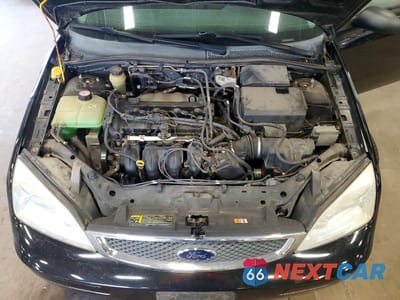Zdjęcie 11 z 12 samochodu: 2005 FORD FOCUS ZX5 VIN:3FAFP37N15R114739 - miniatura