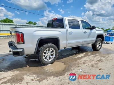 Trzecie zdjęcie samochodu z tyłu: 2017 GMC SIERRA K1500 SLT VIN:3GTU2NEC4HG164077 - miniatura