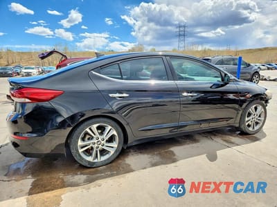 Trzecie zdjęcie samochodu z tyłu: 2017 HYUNDAI ELANTRA LIMITED VIN:KMHD84LF1HU146828 - miniatura