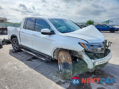 Czwarte zdjęcie samochodu z boku: 2023 HONDA RIDGELINE RTL-E VIN:5FPYK3F7XPB009858 - miniatura