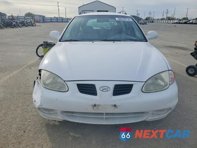 Piąte zdjęcie samochodu w środku: 2000 HYUNDAI ELANTRA GLS VIN:KMHJW35F8YU161844 - miniatura