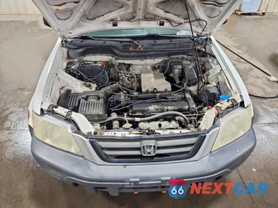 Zdjęcie 12 z 13 samochodu: 1999 HONDA CR-V LX VIN:JHLRD1840XC033391 - miniatura