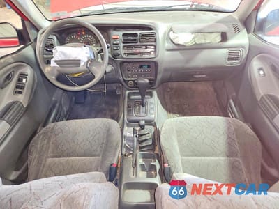 Zdjęcie 8 z 13 samochodu: 2003 CHEVROLET TRACKER VIN:2CNBJ734636938525 - miniatura