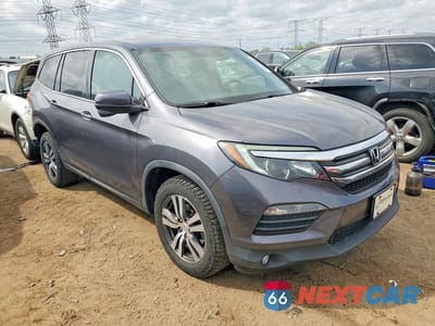 Czwarte zdjęcie samochodu z boku: 2018 HONDA PILOT EXLN VIN:5FNYF6H74JB005713 - miniatura
