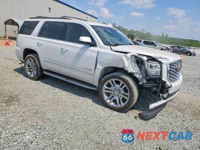 Czwarte zdjęcie samochodu z boku: 2019 GMC YUKON SLT VIN:1GKS1BKC7KR325773 - miniatura
