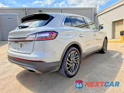 Czwarte zdjęcie samochodu z boku: 2019 LINCOLN NAUTILUS RESERVE VIN:2LMPJ6L92KBL50613 - miniatura