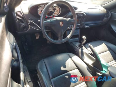 Zdjęcie 8 z 11 samochodu: 2004 PORSCHE BOXSTER VIN:WP0CA29894U620536 - miniatura