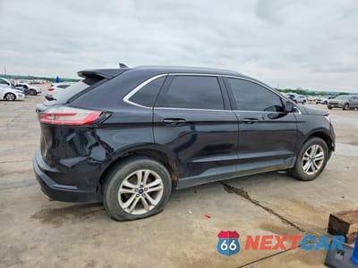 Trzecie zdjęcie samochodu z tyłu: 2020 FORD EDGE SEL VIN:2FMPK3J96LBA57339 - miniatura