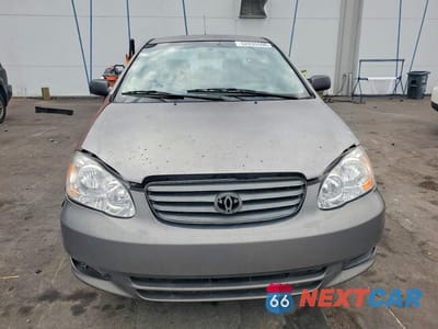 Piąte zdjęcie samochodu w środku: 2004 TOYOTA COROLLA CE VIN:1NXBR32E34Z305060 - miniatura