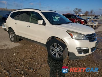 Czwarte zdjęcie samochodu z boku: 2015 CHEVROLET TRAVERSE LT VIN:1GNKVGKDXFJ324196 - miniatura