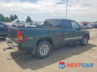 Trzecie zdjęcie samochodu z tyłu: 2003 GMC NEW SIERRA K1500 VIN:1GTEK19TX3E238111 - miniatura