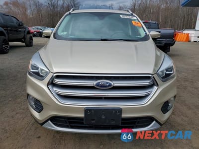 Piąte zdjęcie samochodu w środku: 2017 FORD ESCAPE TITANIUM VIN:1FMCU9J97HUD80568 - miniatura
