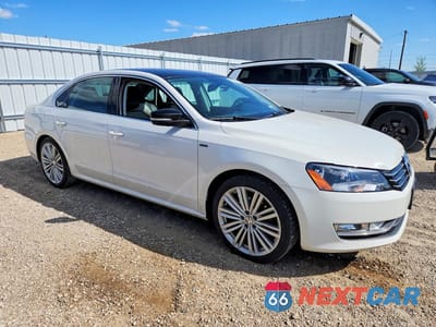 Czwarte zdjęcie samochodu z boku: 2015 VOLKSWAGEN PASSAT SE VIN:1VWBS7A38FC096761 - miniatura
