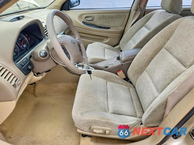 Zdjęcie 7 z 12 samochodu: 2003 NISSAN MAXIMA GXE VIN:JN1DA31D13T525270 - miniatura