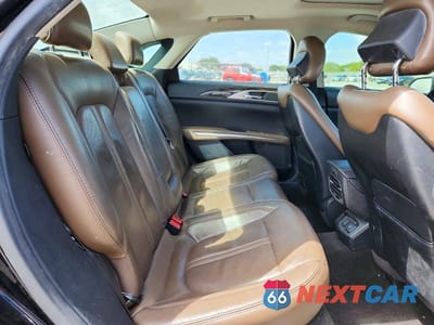 Zdjęcie 10 z 12 samochodu: 2016 LINCOLN MKZ HYBRID VIN:3LN6L2LU2GR624948 - miniatura