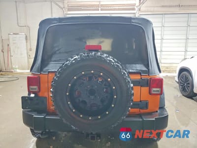 Zdjęcie 6 z 13 samochodu: 2011 JEEP WRANGLER UNLIMITED RUBICON VIN:1J4BA6H1XBL520174 - miniatura