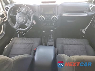 Zdjęcie 8 z 13 samochodu: 2012 JEEP WRANGLER UNLIMITED SAHARA VIN:1C4HJWEG9CL123176 - miniatura