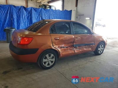 Trzecie zdjęcie samochodu z tyłu: 2009 KIA RIO BASE VIN:KNADE223796534285 - miniatura