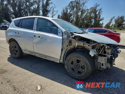 Czwarte zdjęcie samochodu z boku: 2014 TOYOTA RAV4 LE VIN:2T3BFREV7EW190687 - miniatura