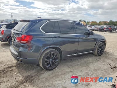 Trzecie zdjęcie samochodu z tyłu: 2014 BMW X5 SDRIVE35I VIN:5UXKR2C5XE0H31965 - miniatura
