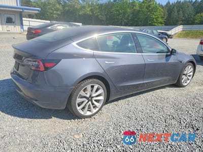 Trzecie zdjęcie samochodu z tyłu: 2019 TESLA MODEL 3 VIN:5YJ3E1EB0KF389113 - miniatura