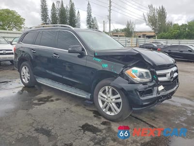 Czwarte zdjęcie samochodu z boku: 2015 MERCEDES-BENZ GL 450 4MATIC VIN:4JGDF6EE7FA522811 - miniatura
