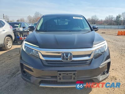 Piąte zdjęcie samochodu w środku: 2020 HONDA PILOT EXL VIN:5FNYF6H57LB047391 - miniatura