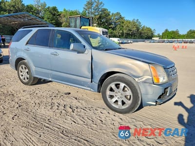 Czwarte zdjęcie samochodu z boku: 2007 CADILLAC SRX VIN:1GYEE637570160317 - miniatura