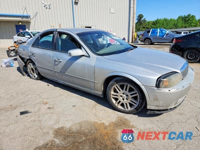 Czwarte zdjęcie samochodu z boku: 2003 LINCOLN LS VIN:1LNHM87A73Y660008 - miniatura