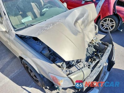 Zdjęcie 11 z 12 samochodu: 2001 TOYOTA CAMRY LE VIN:JT2BG28K110606441 - miniatura