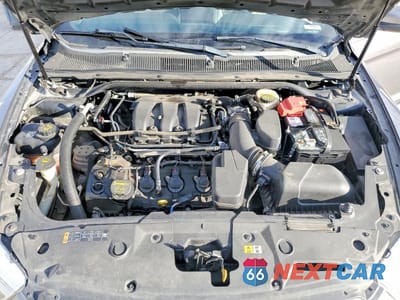 Zdjęcie 11 z 12 samochodu: 2013 FORD TAURUS SEL VIN:1FAHP2H81DG222747 - miniatura