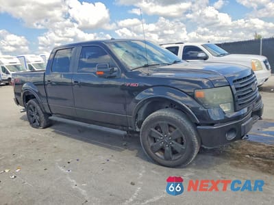 Czwarte zdjęcie samochodu z boku: 2014 FORD F150 SUPERCREW VIN:1FTFW1ET3EFC26829 - miniatura