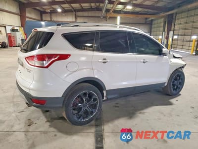 Trzecie zdjęcie samochodu z tyłu: 2014 FORD ESCAPE TITANIUM VIN:1FMCU9J98EUA73034 - miniatura