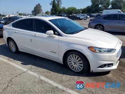 Czwarte zdjęcie samochodu z boku: 2014 FORD FUSION SE HYBRID VIN:3FA6P0LU7ER195144 - miniatura