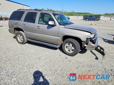 Czwarte zdjęcie samochodu z boku: 2003 CHEVROLET TAHOE C1500 VIN:1GNEC13Z53J289007 - miniatura