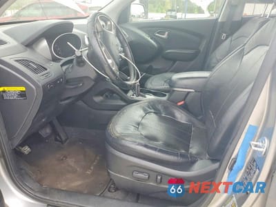 Zdjęcie 7 z 12 samochodu: 2013 HYUNDAI TUCSON LIMITED VIN:KM8JU3AC6DU564331 - miniatura