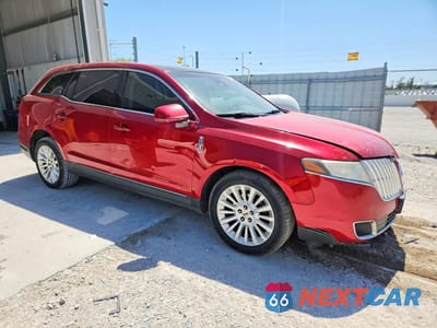 Czwarte zdjęcie samochodu z boku: 2011 LINCOLN MKT VIN:2LMHJ5FR3BBJ54142 - miniatura