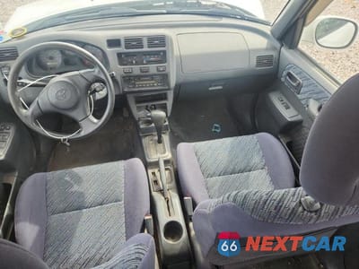 Zdjęcie 8 z 13 samochodu: 1999 TOYOTA RAV4 BASE VIN:JT3HP10V7X7117595 - miniatura